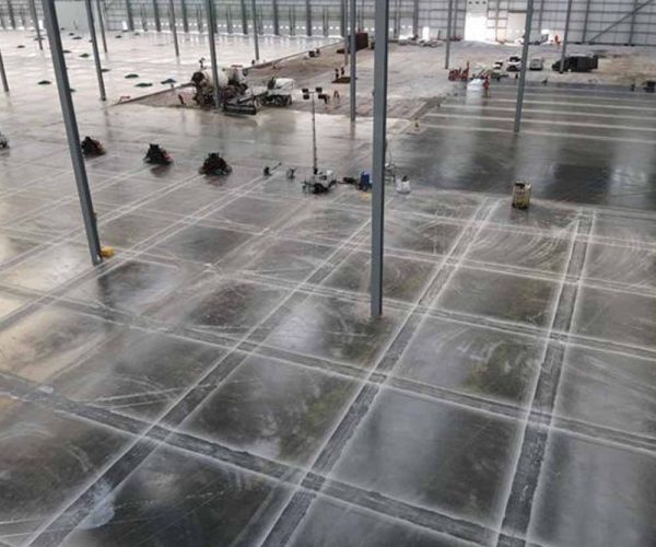 Large finished concrete flooring inside a warehouse